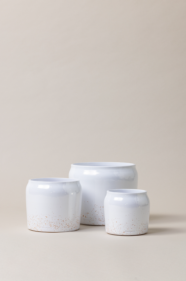 set of three terracotta glazed plant pots in white color
