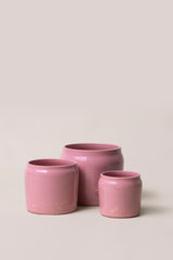 set of three pink planters with different sizes