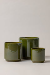 set of three Terracotta glazed plant pots of different sizes in green color