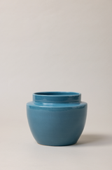 Terracotta glazed plant pot in blue color