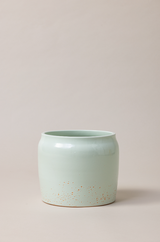 Terracotta glazed plant pot in mint green color